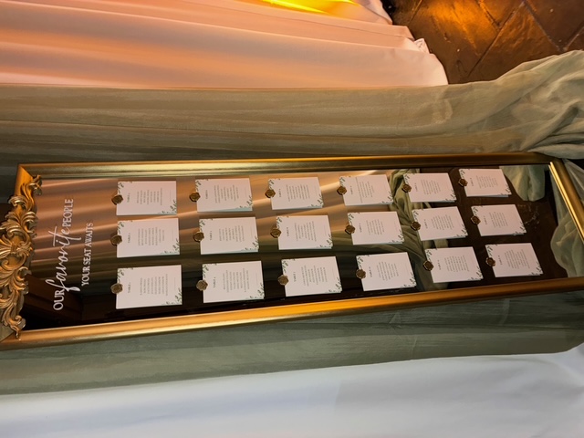 Wedding seating chart gold mirror